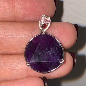 Sterling silver pendant with round amethyst stone